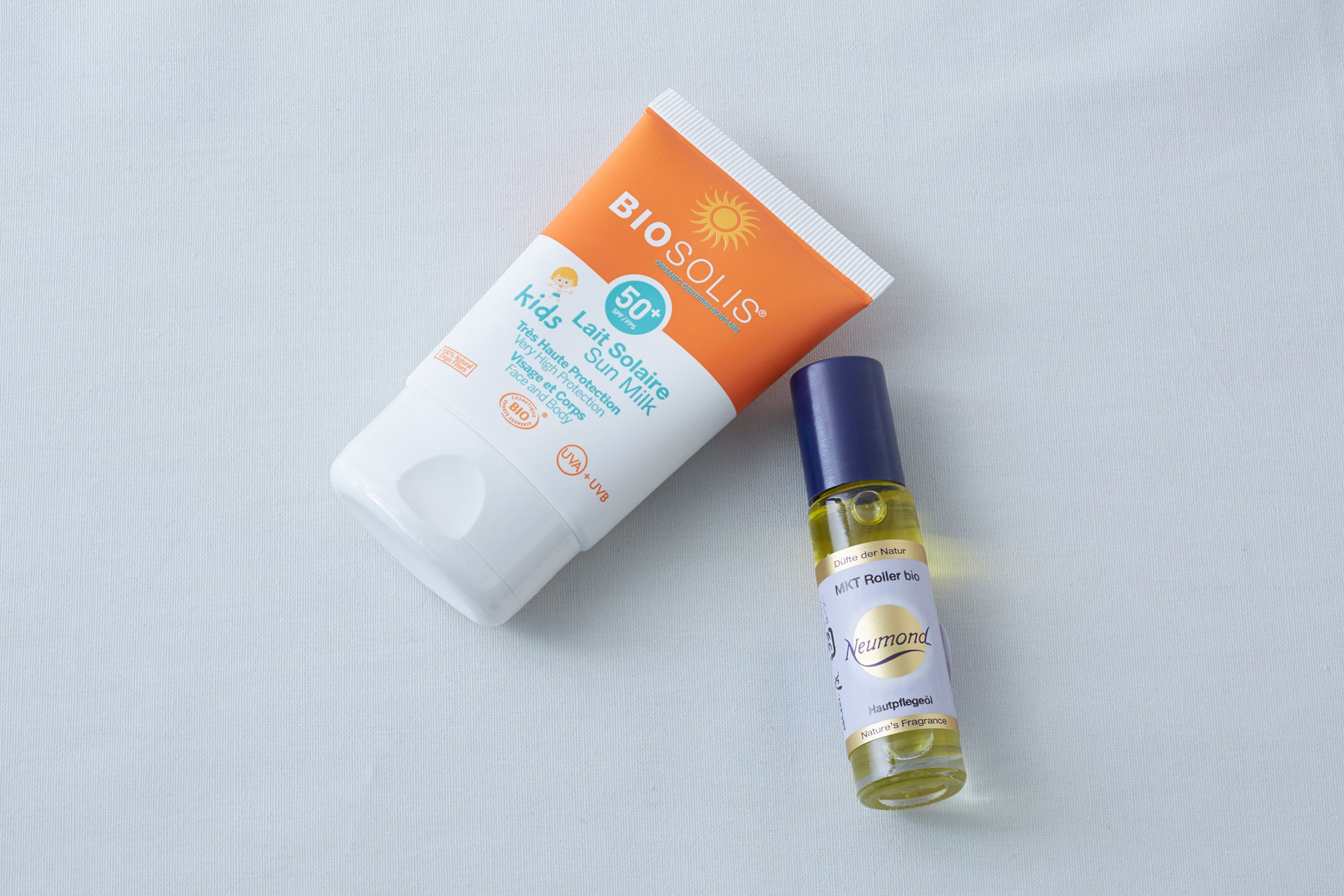 【左上】「ビオソリス」サンプロテクションミルクキッズ50+(フェイス&ボディ用)(SPF50+/PA++++/50ml) ¥3,800、【右下】「ノイモンド」MKTローラーbio(各11ml) ¥1,200 〈販売場所:1階:イベントステージ1-I〉